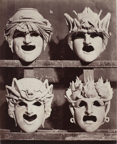 Delmaet & Durandelle - Construction de l'Opéra de Paris, quatre masques