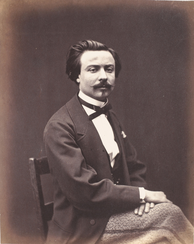 Achille Bonnuit - Homme assis, jambes et mains croisées