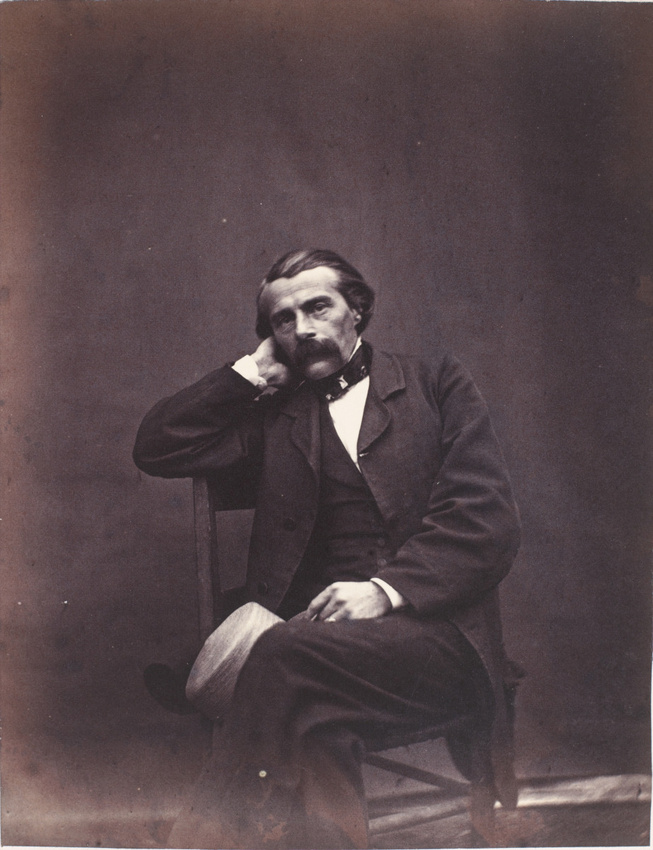 Achille Bonnuit - Homme assis, bras droit plié, tenant un chapeau à la main gauc...