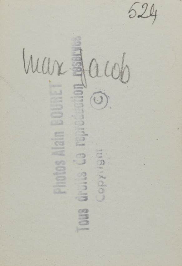 Anonyme - Max Jacob en redingote et haut-de-forme, appuyé sur une canne