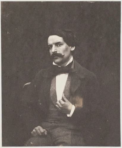Auguste Vacquerie - François-Victor Hugo assis, de face, la main gauche au rever...