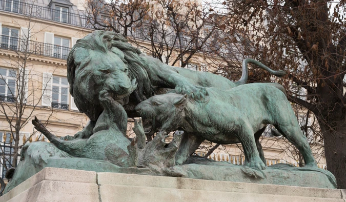 Auguste Cain - Lion et lionne se disputant un sanglier