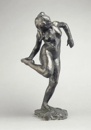 Danseuse regardant la plante de son pied droit, première étude - Edgar Degas
