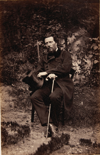 Achille Bonnuit - Homme assis, dans le jardin, chapeau et canne à la main
