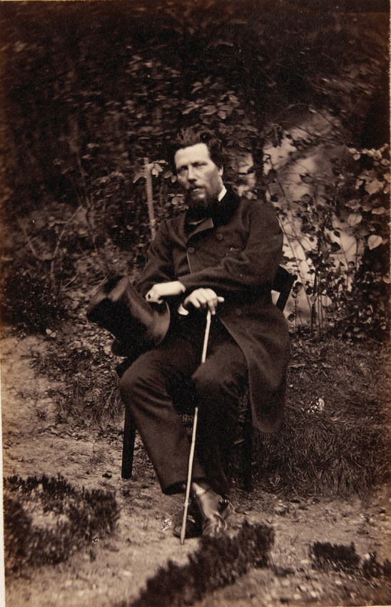 Achille Bonnuit - Homme assis, dans le jardin, chapeau et canne à la main