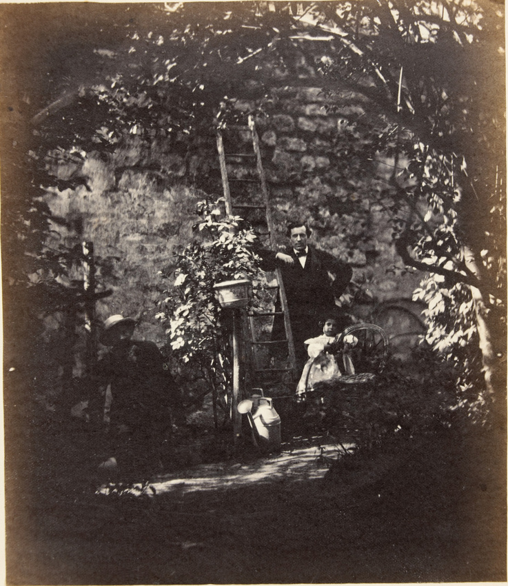 Achille Bonnuit - Deux hommes et un enfant dans le jardin